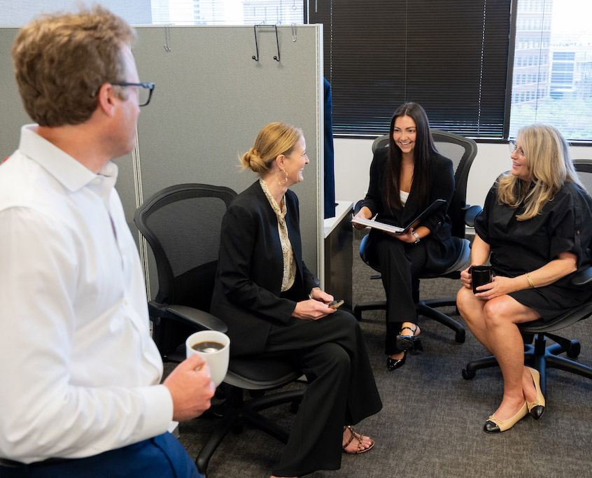 two professional business men in an office setting looking at paper work together for thomas edwards group accounting and finance search firm for candidates in dallas and fort worth texas 
